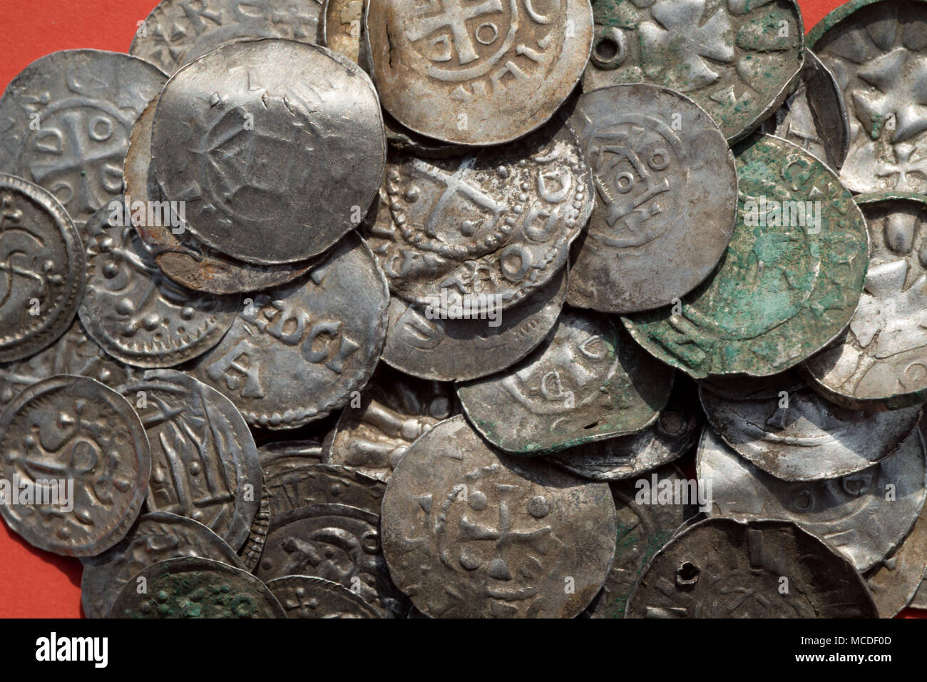 13 april 2018 germany schaprode an assortment of saxon ottonian danish and byzantine coins some of which were apparently used as pendants perforated with a hole on a table archaeologists have discovered valuable predominantly scandi